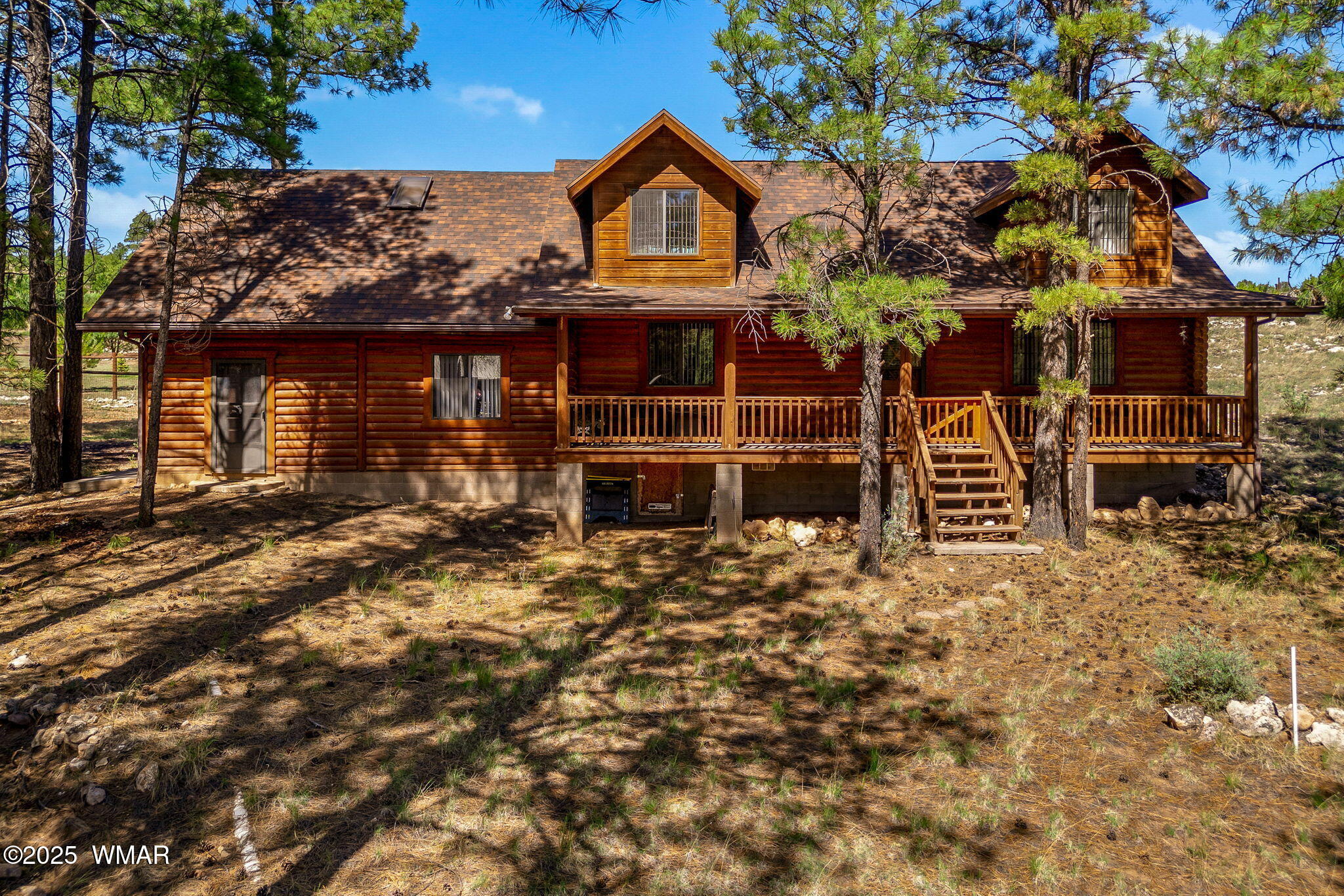 1850 Ansell Road Heber, AZ 85928 - Photo 1 of 34 a front view of a house with a yard