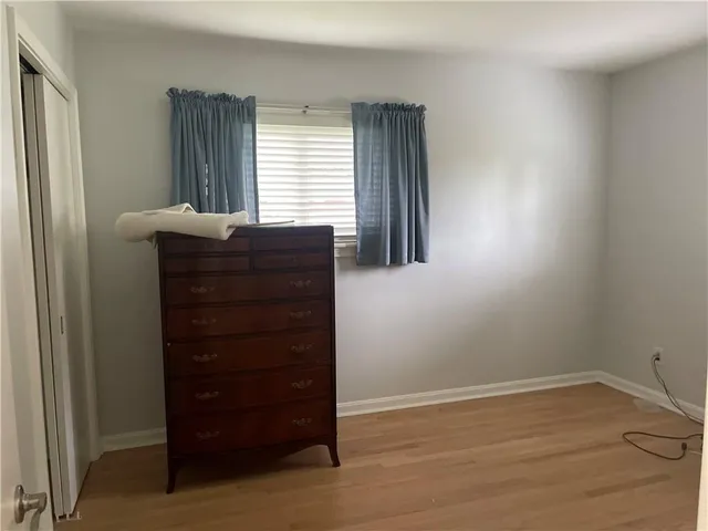 wooden floor and window in a room