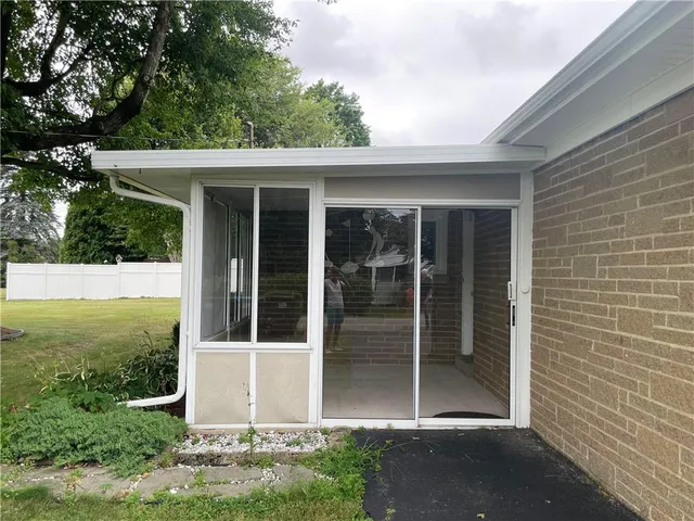a view of an empty room with a sliding door