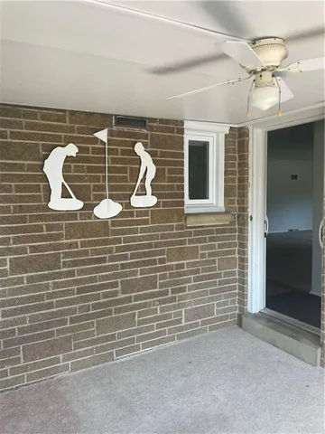 a view of a porch with a floor to ceiling window