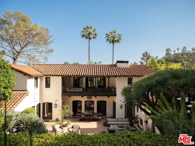 a view of a house with a garden