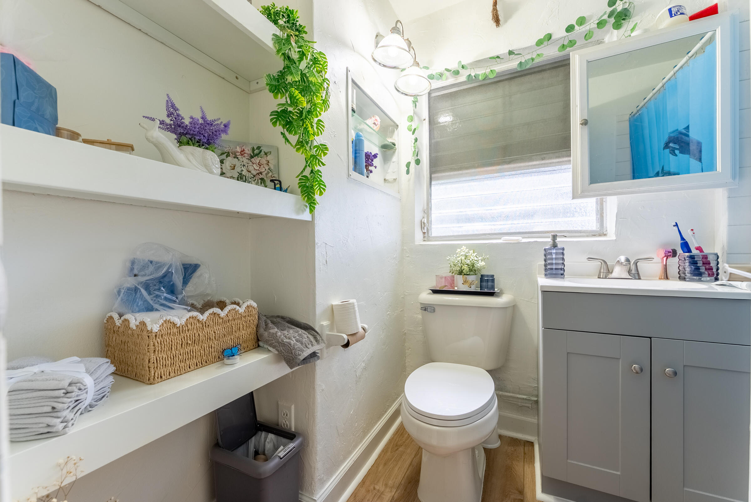 730 North 5th Street Lantana, FL 33462 - Photo 30 of 39 a bathroom with a sink mirror and toilet