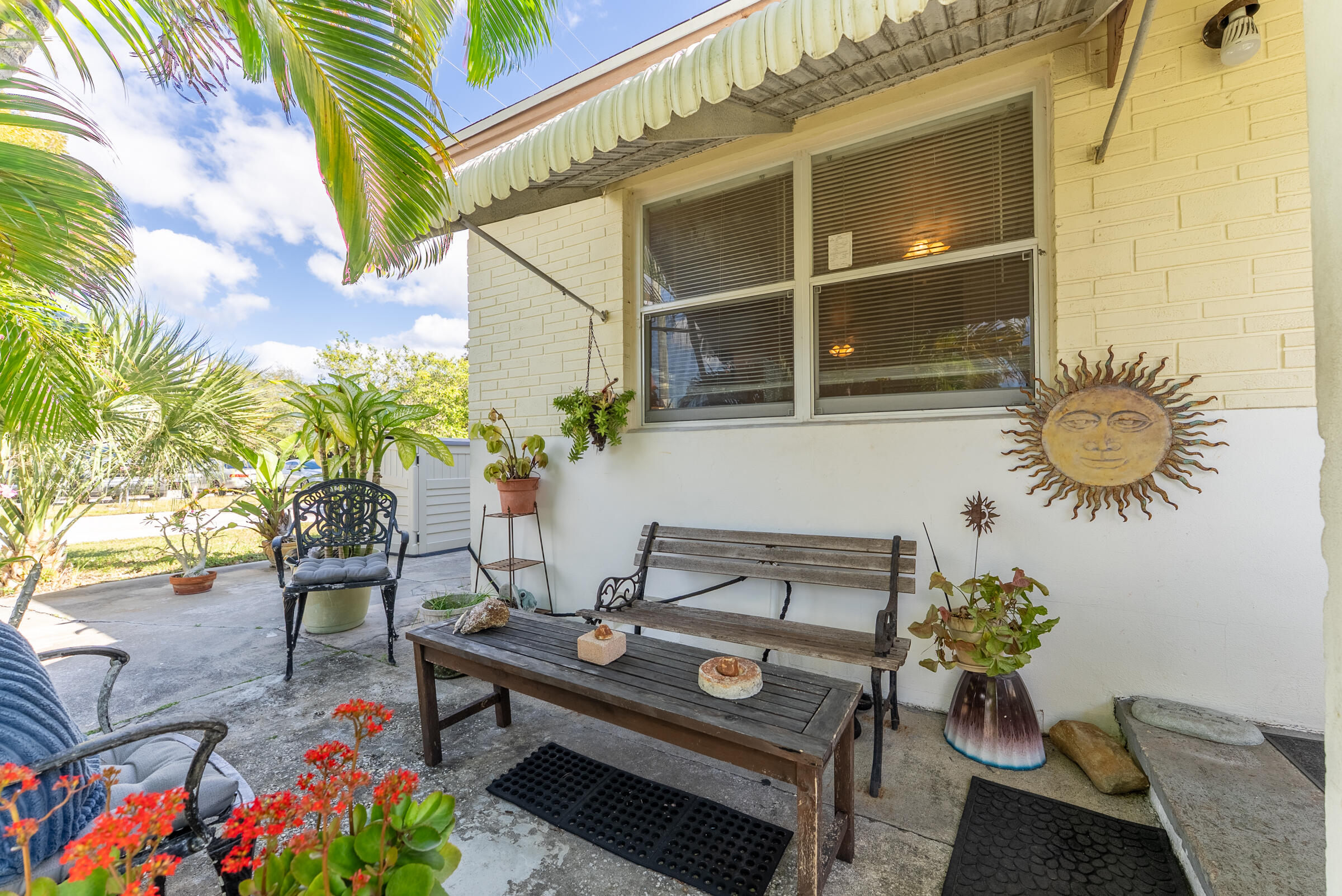 730 North 5th Street Lantana, FL 33462 - Photo 10 of 39 a outdoor living space with furniture and flowers