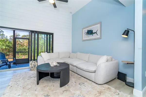 a living room with furniture and a table