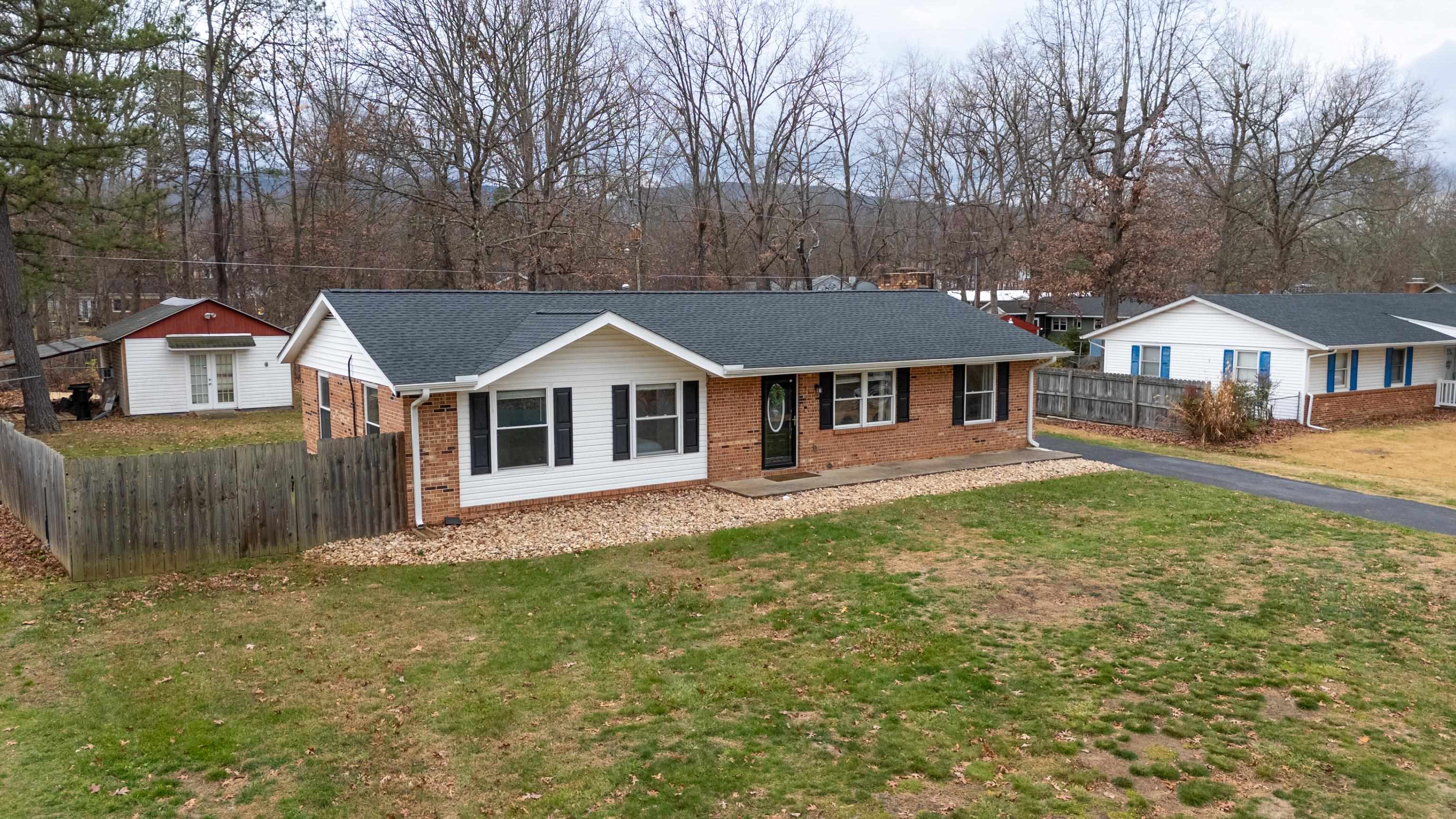 77 Greenway Road Stuarts Draft, VA 24477 - Photo 51 of 57 a front view of a house with a yard