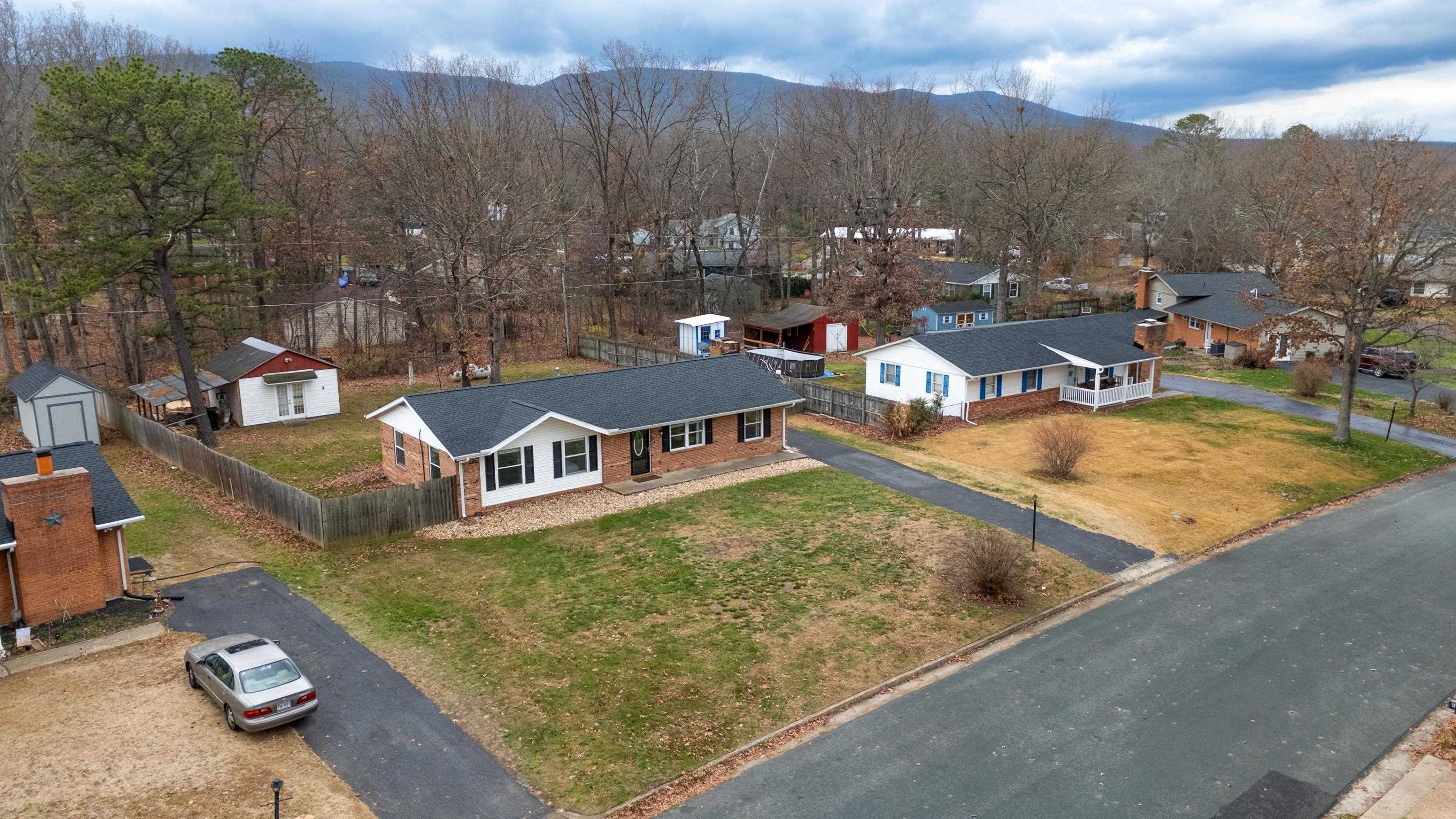 77 Greenway Road Stuarts Draft, VA 24477 - Photo 52 of 57 a view of a house with pool and chairs