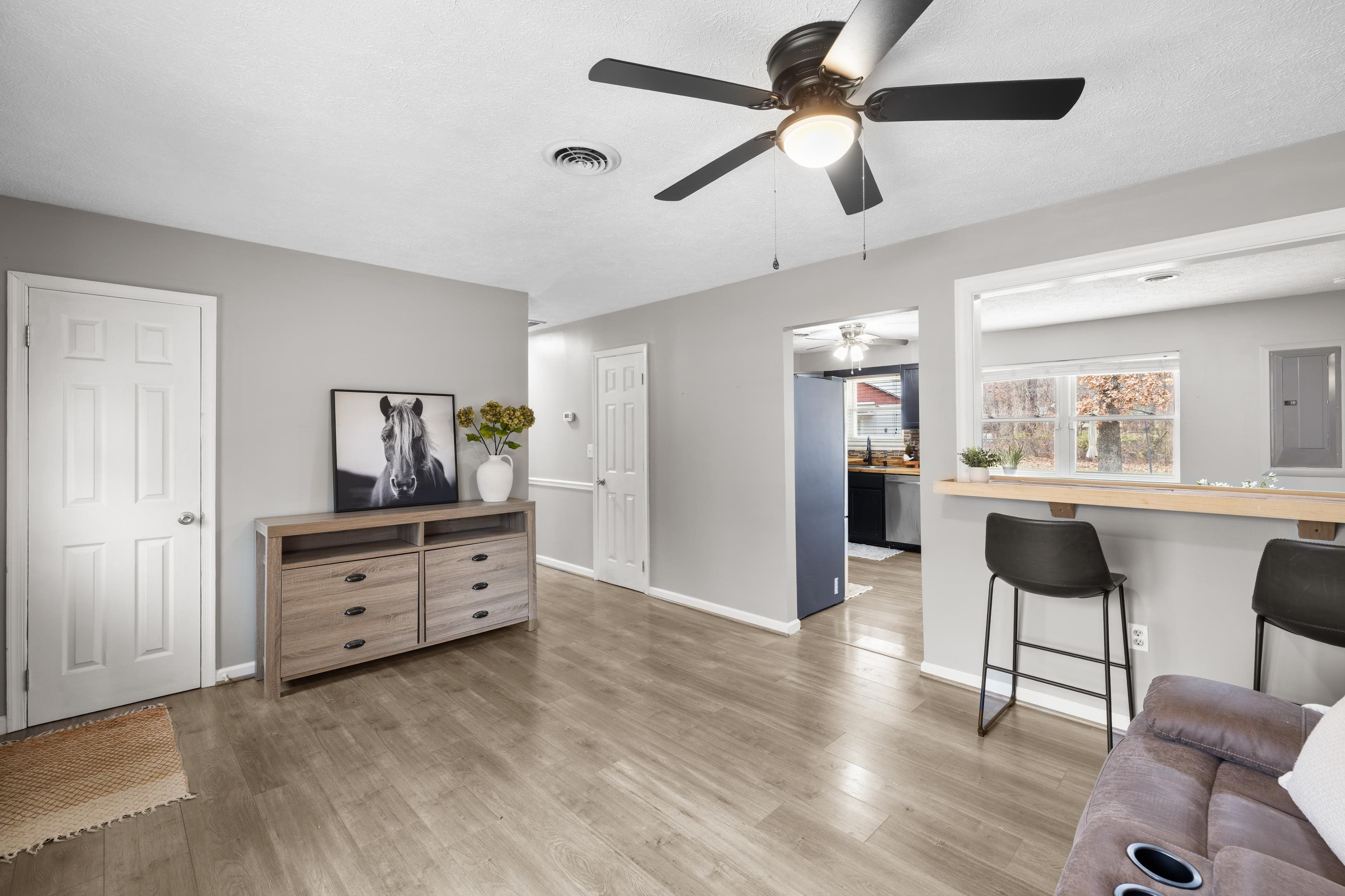 77 Greenway Road Stuarts Draft, VA 24477 - Photo 10 of 57 a room with furniture and a wooden floor