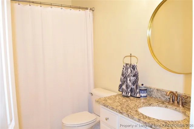 a view of livingroom with furniture and window