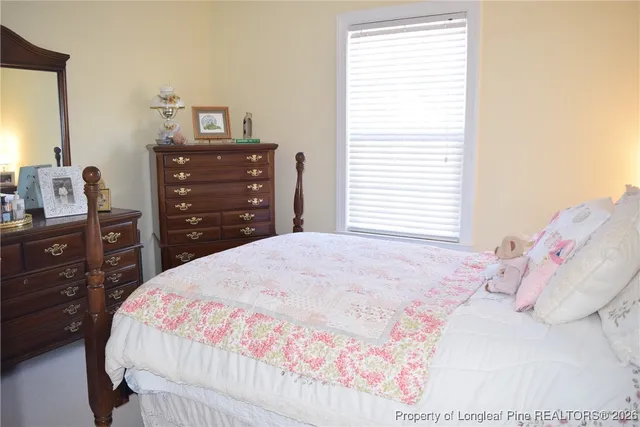 a view of a balcony with furniture