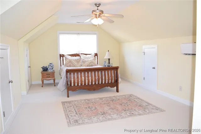 a front view of a house with a yard covered in snow