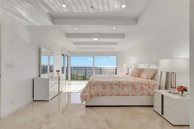 a bathroom with a tub shower and sink