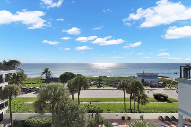 a view of residential houses with outdoor space