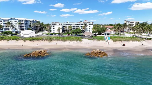 a view of a balcony with chairs