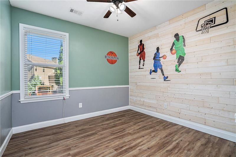 115 Floating Leaf Way Dallas, GA 30132 - Photo 23 of 49 wooden floor in an empty room with a window