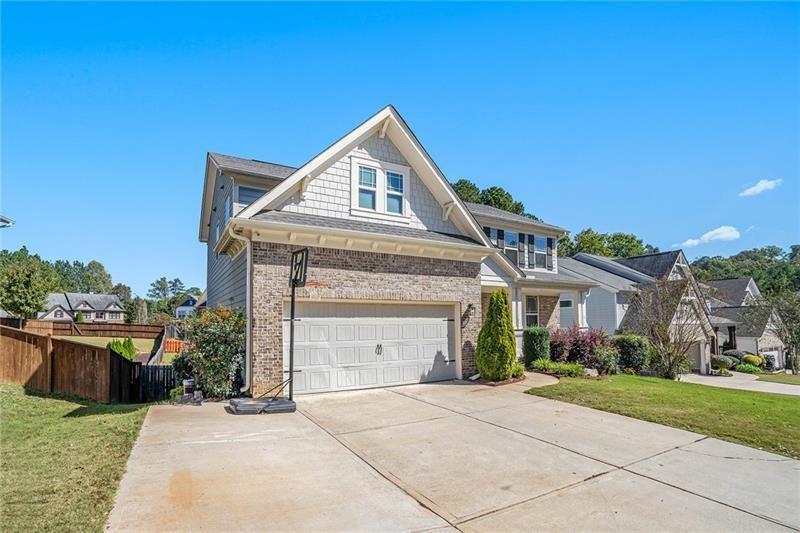 115 Floating Leaf Way Dallas, GA 30132 - Photo 49 of 49 a front view of a house with a yard