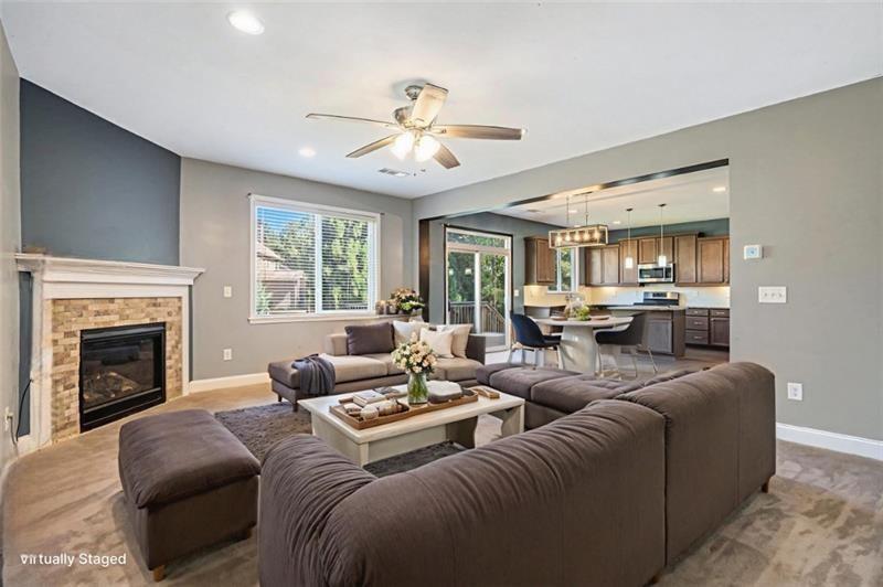 115 Floating Leaf Way Dallas, GA 30132 - Photo 10 of 49 a living room with furniture fireplace and a large window