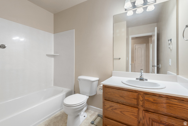 802 Brookside Court Payson, UT 84651 - Photo 30 of 32 Full bath featuring vanity, light tile patterned floors, and bathtub / shower combination