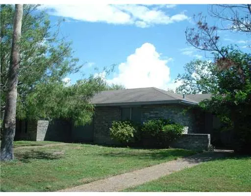 a view of a garden with a fountain