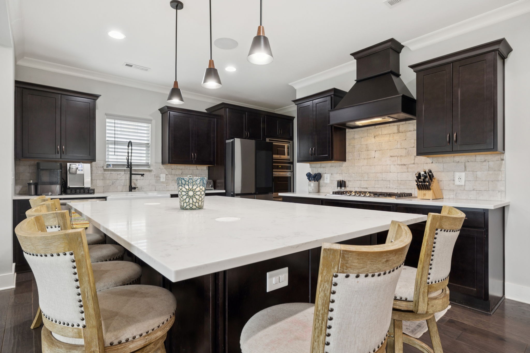 247 Croft Way Mount Juliet, TN 37122 - Photo 14 of 66 a kitchen with a table chairs sink and cabinets