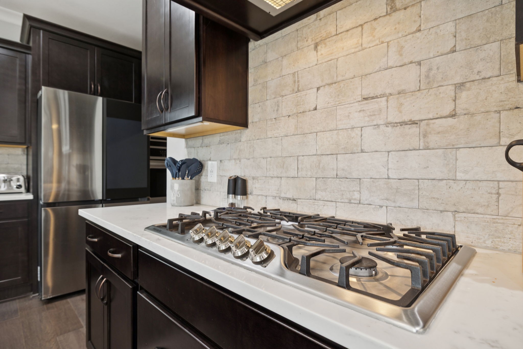 247 Croft Way Mount Juliet, TN 37122 - Photo 21 of 66 a kitchen with a stove a refrigerator and cabinets