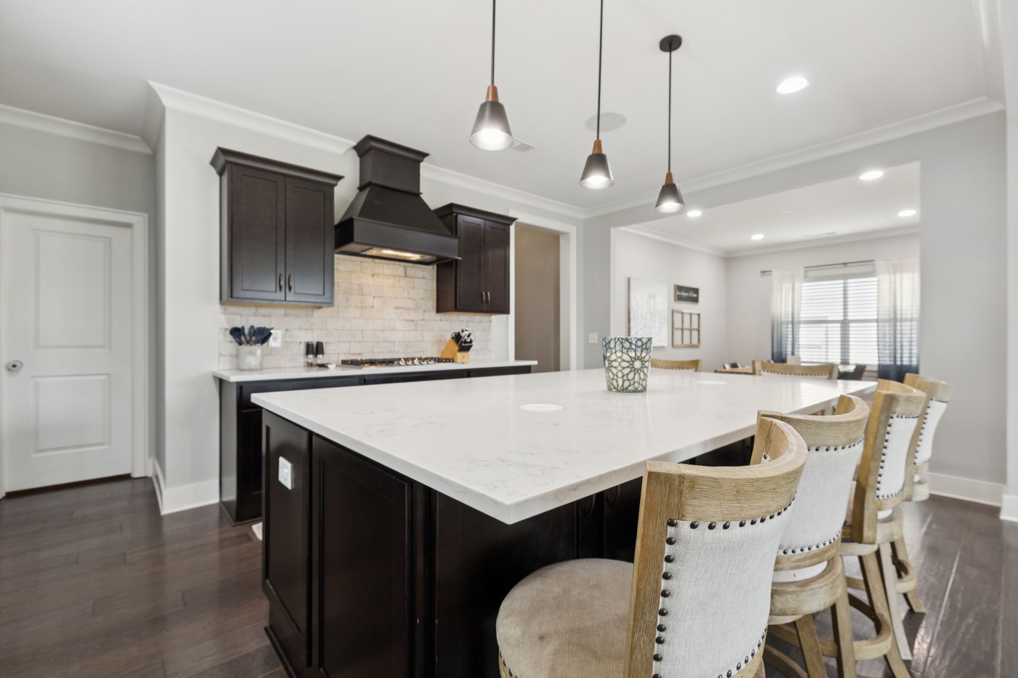 247 Croft Way Mount Juliet, TN 37122 - Photo 22 of 66 a kitchen with a table chairs refrigerator and microwave
