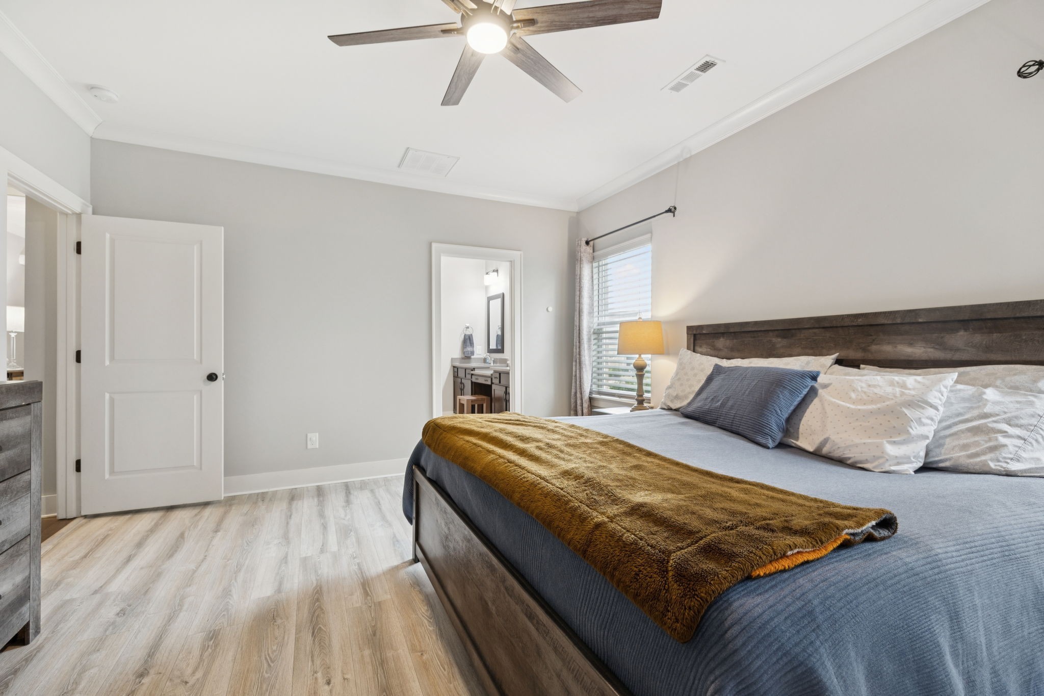 247 Croft Way Mount Juliet, TN 37122 - Photo 26 of 66 a bedroom with a bed and wooden floor