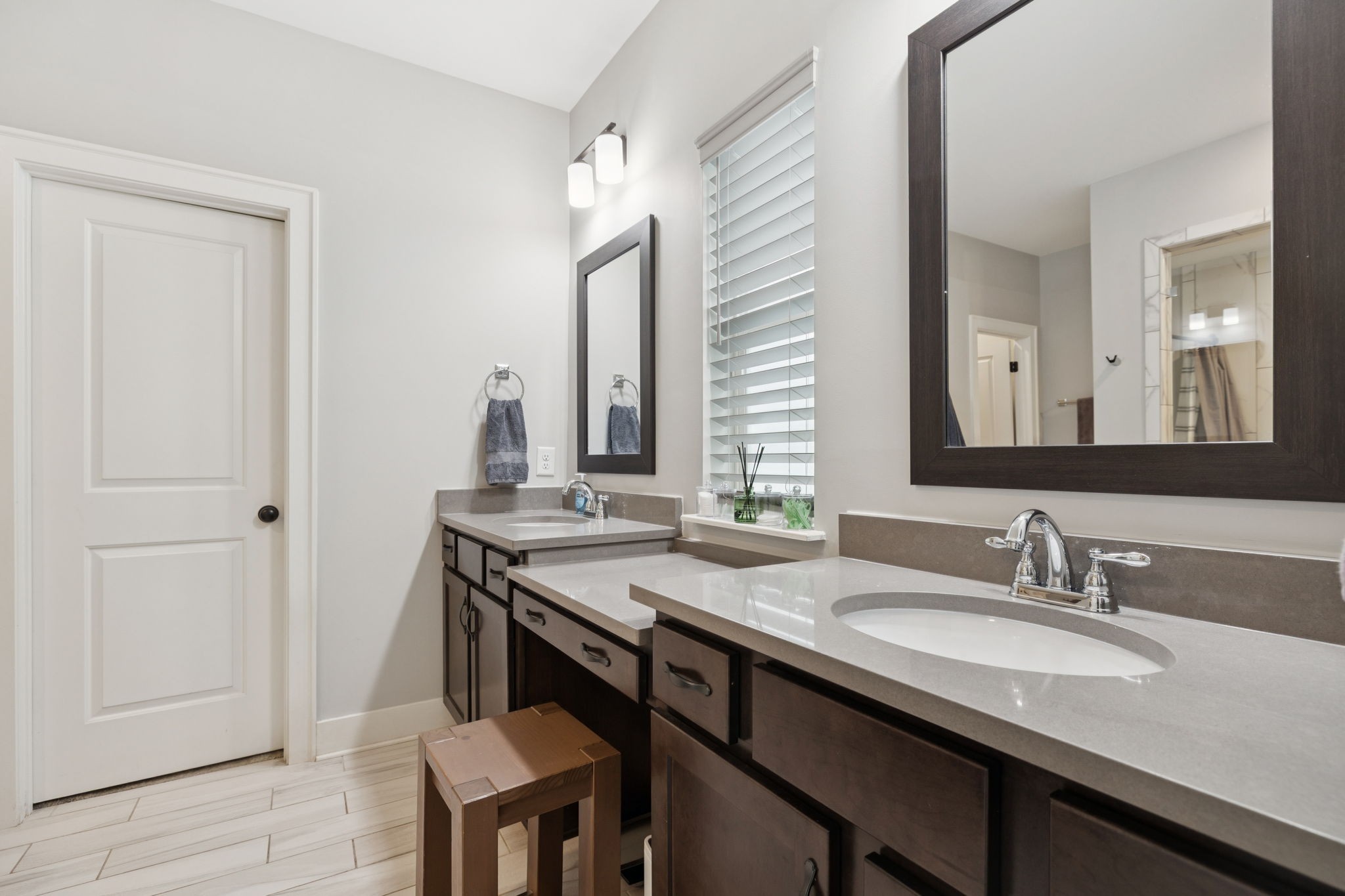 247 Croft Way Mount Juliet, TN 37122 - Photo 28 of 66 a bathroom with a granite countertop sink a mirror and a vanity