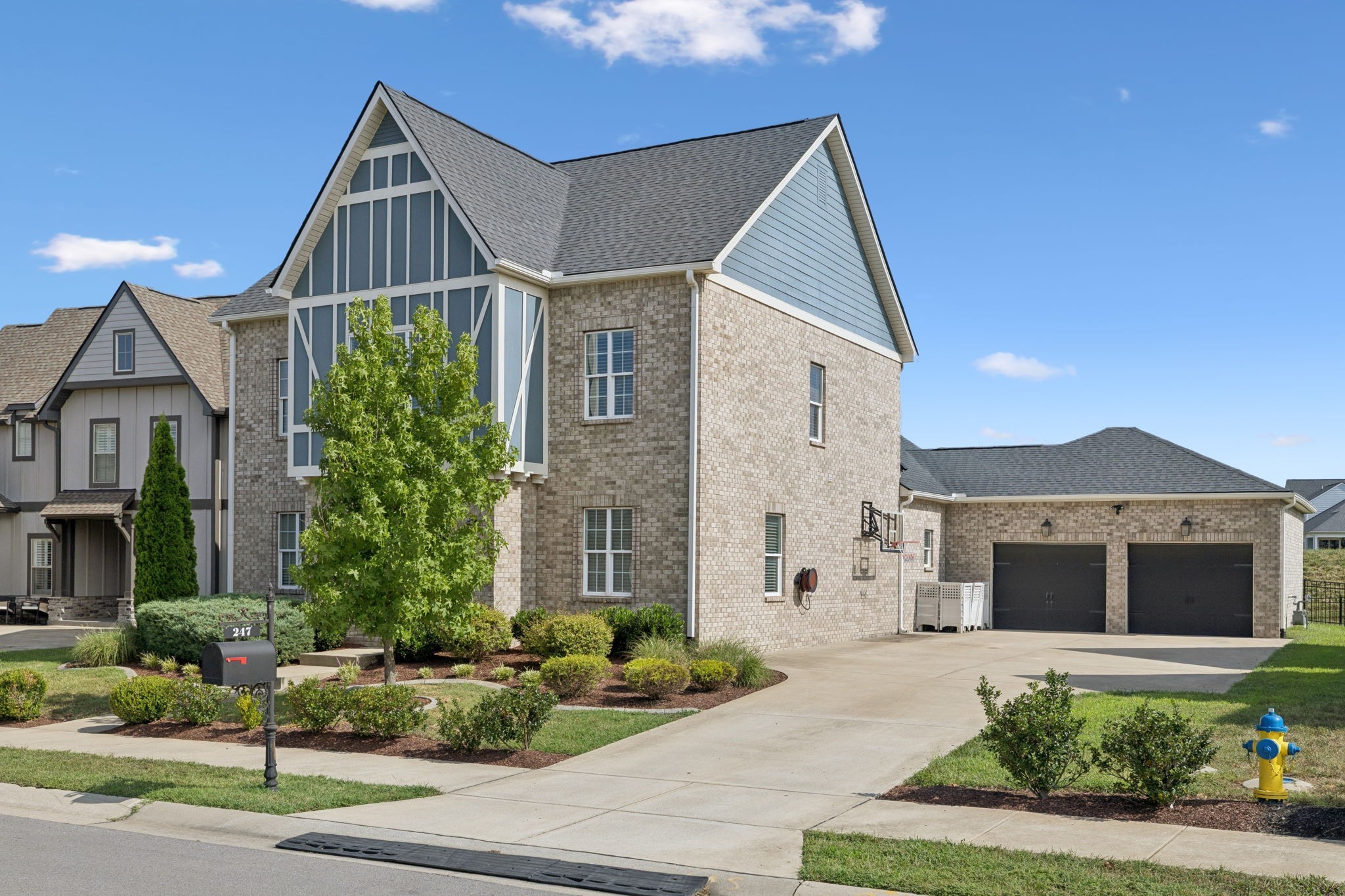 247 Croft Way Mount Juliet, TN 37122 - Photo 3 of 66 a view of a house with a yard and plants