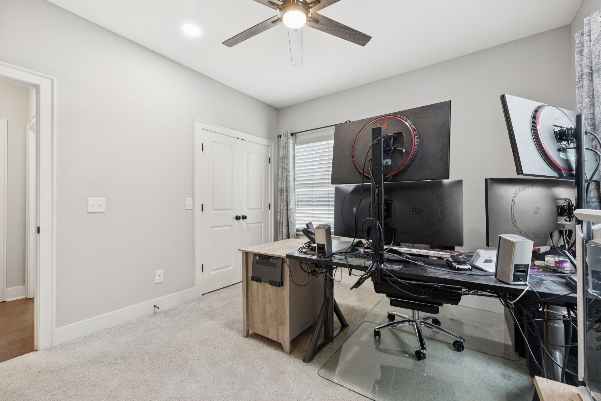 247 Croft Way Mount Juliet, TN 37122 - Photo 34 of 66 a view of workspace with wooden floor windows gym equipment and entryway