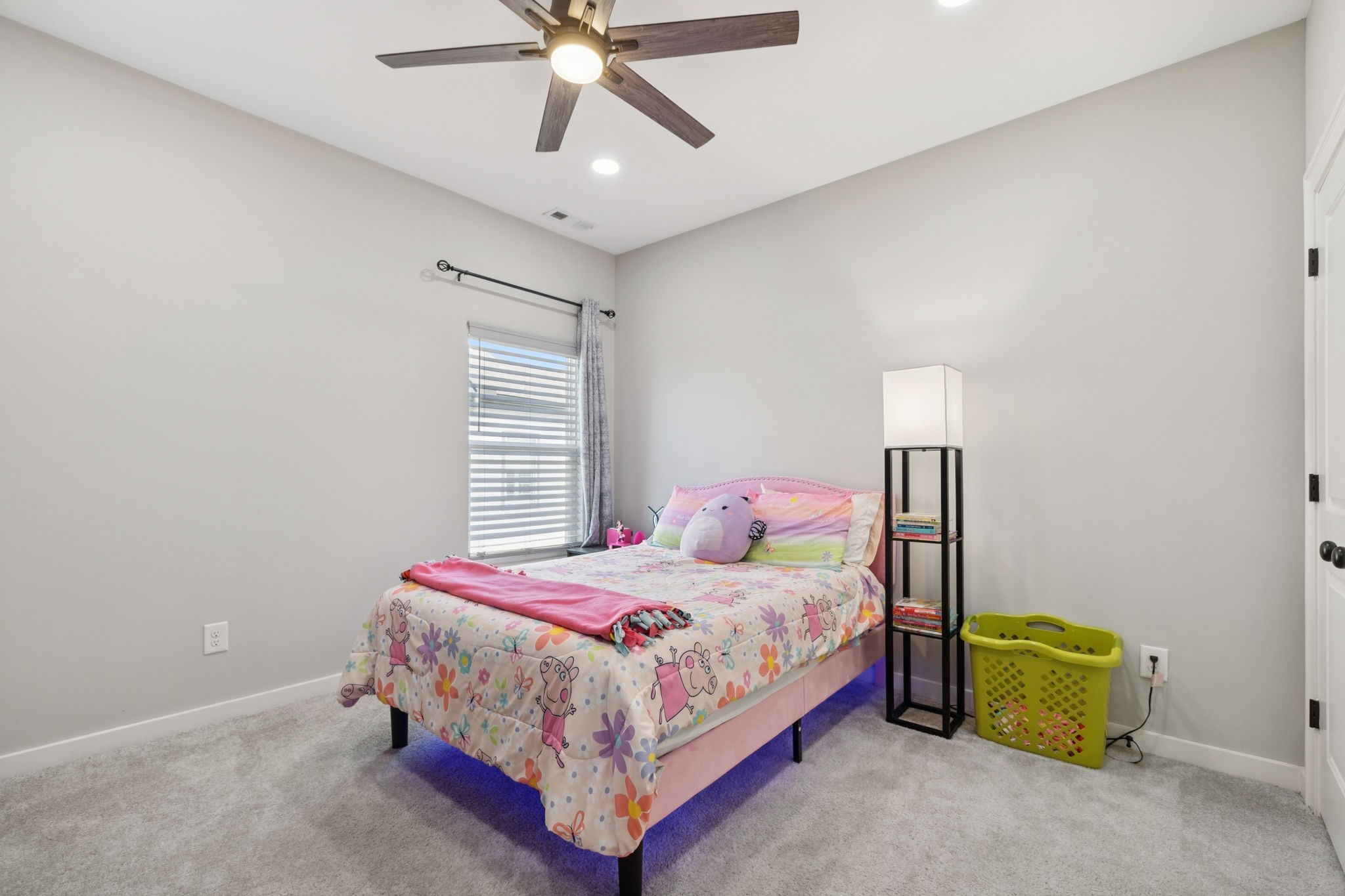 247 Croft Way Mount Juliet, TN 37122 - Photo 41 of 66 a bedroom with a bed and a chandelier