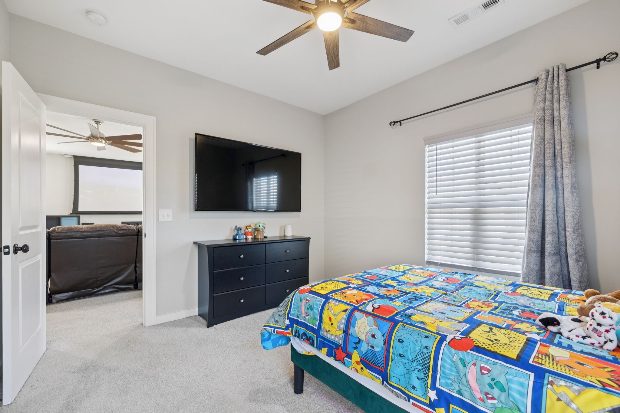 247 Croft Way Mount Juliet, TN 37122 - Photo 46 of 66 a bedroom that has a bed and a flat tv screen on dresser