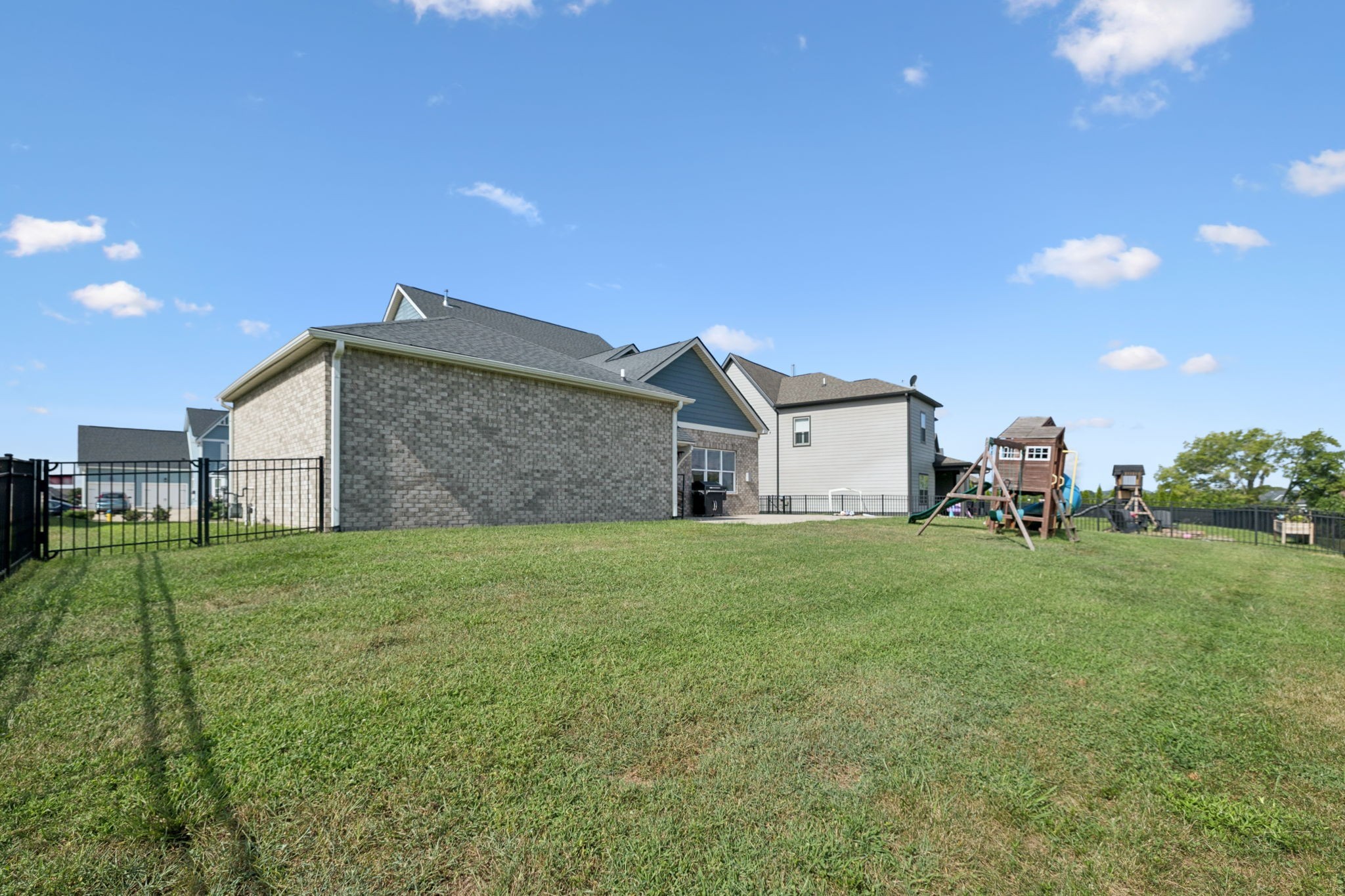 247 Croft Way Mount Juliet, TN 37122 - Photo 58 of 66 a view of a backyard with plants and a garden