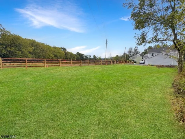 a view of a golf course with a lake