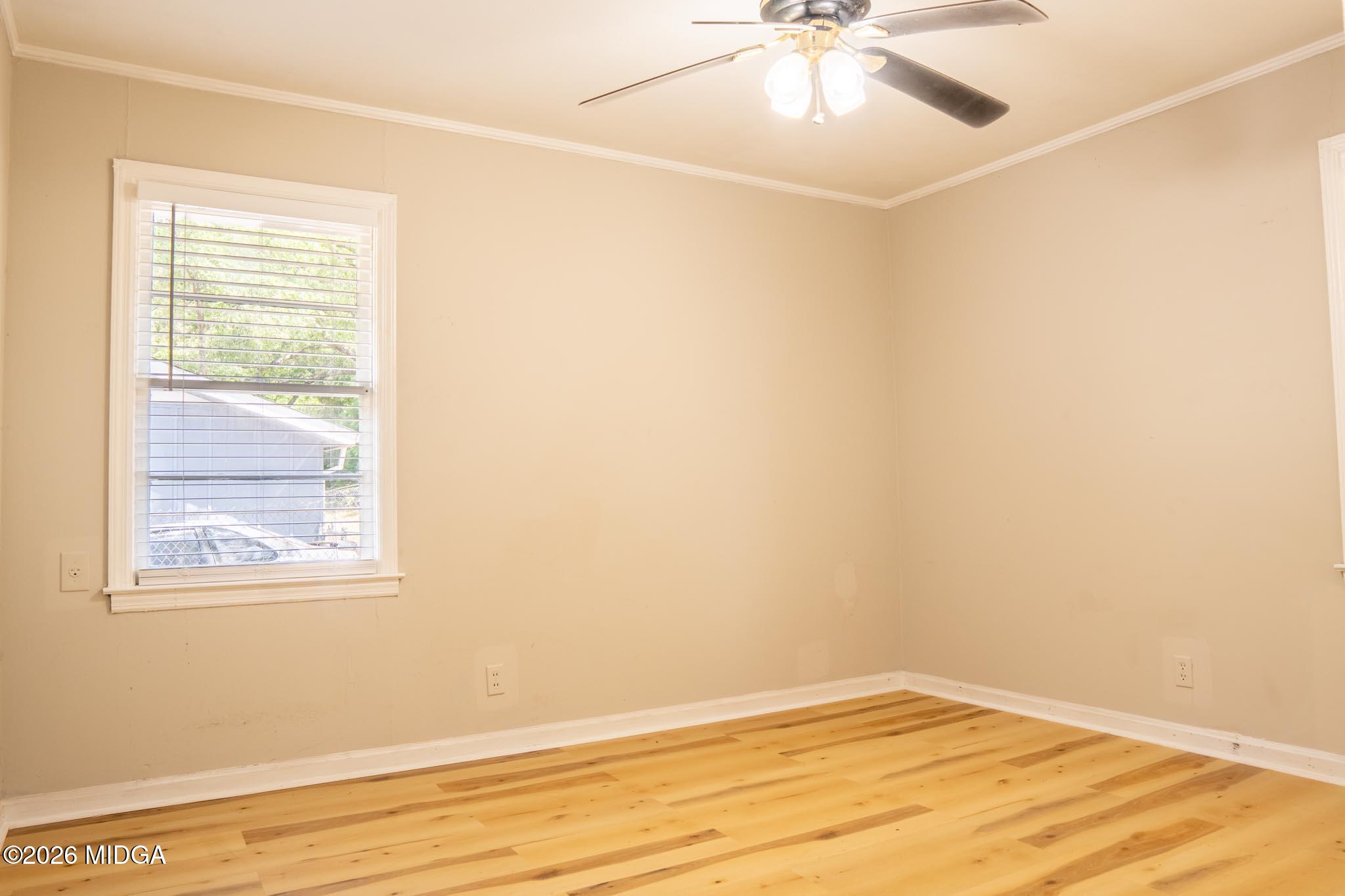 3319 Mohawk Road Macon, GA 31217 - Photo 28 of 38 an empty room with a window and a fan