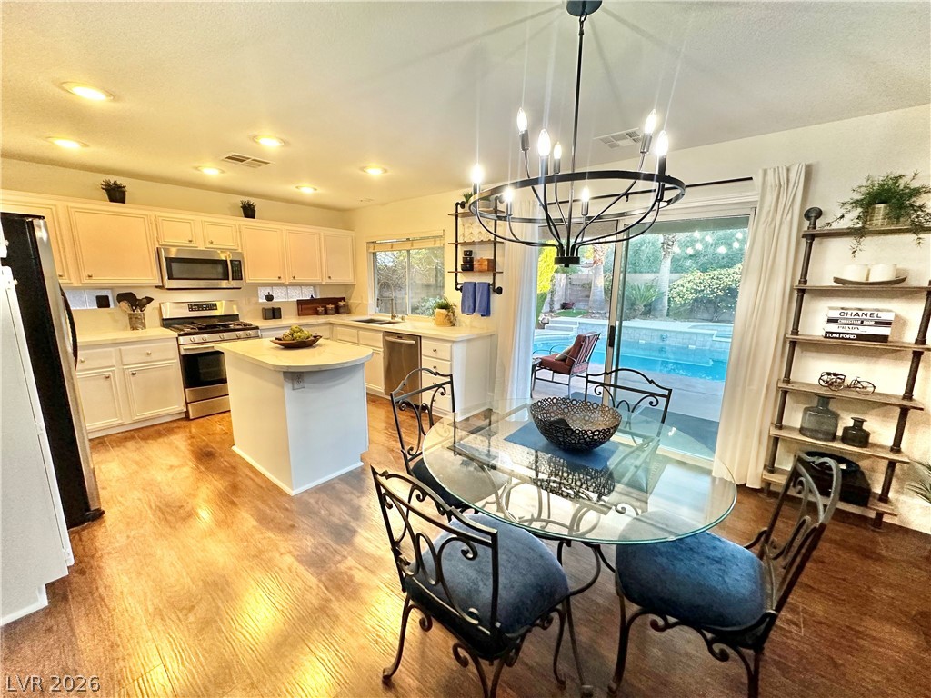 10263 Splendor Ridge Avenue Las Vegas, NV 89135 - Photo 13 of 55 SPACIOUS KITCHEN WITH ISLAND.