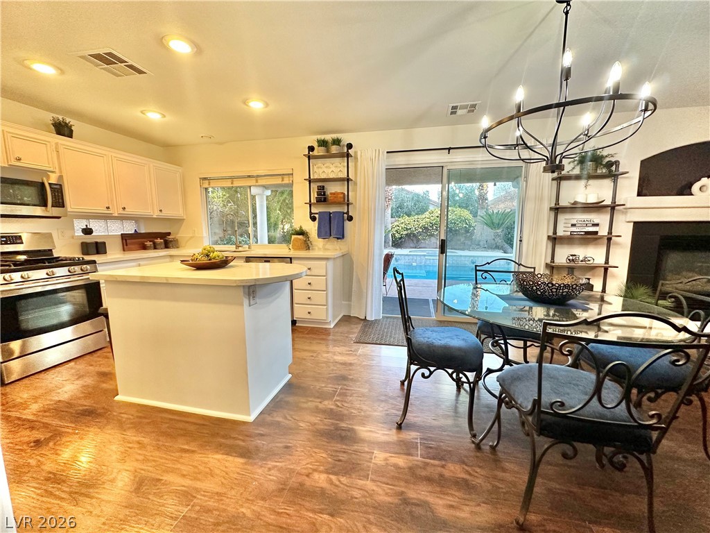 10263 Splendor Ridge Avenue Las Vegas, NV 89135 - Photo 14 of 55 GORGEOUS POOL VIEW FROM KITCHEN.