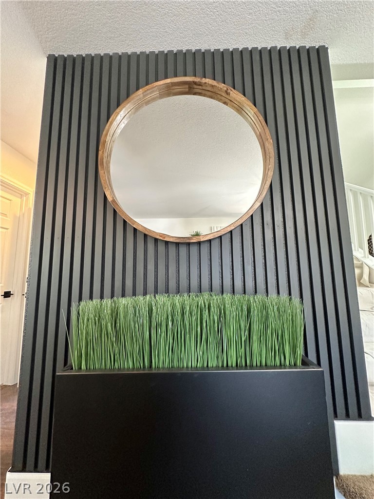 10263 Splendor Ridge Avenue Las Vegas, NV 89135 - Photo 16 of 55 MODERN ACCENT WALL IN FAMILY ROOM.