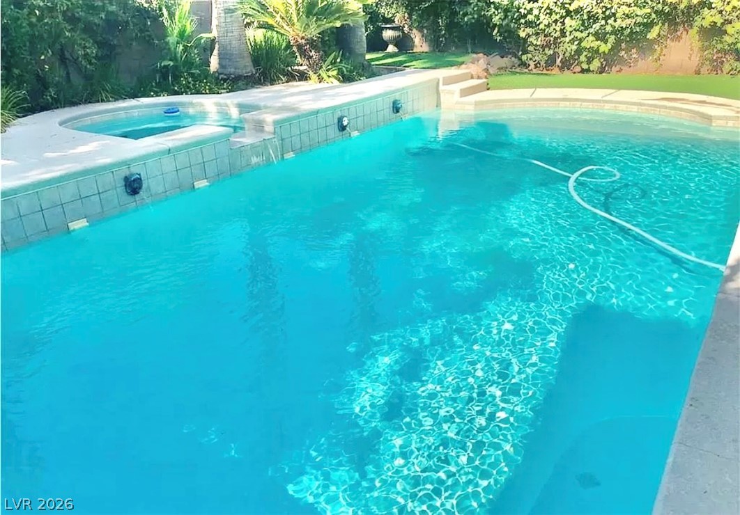 10263 Splendor Ridge Avenue Las Vegas, NV 89135 - Photo 25 of 55 SPARKLING POOL AND SPA.