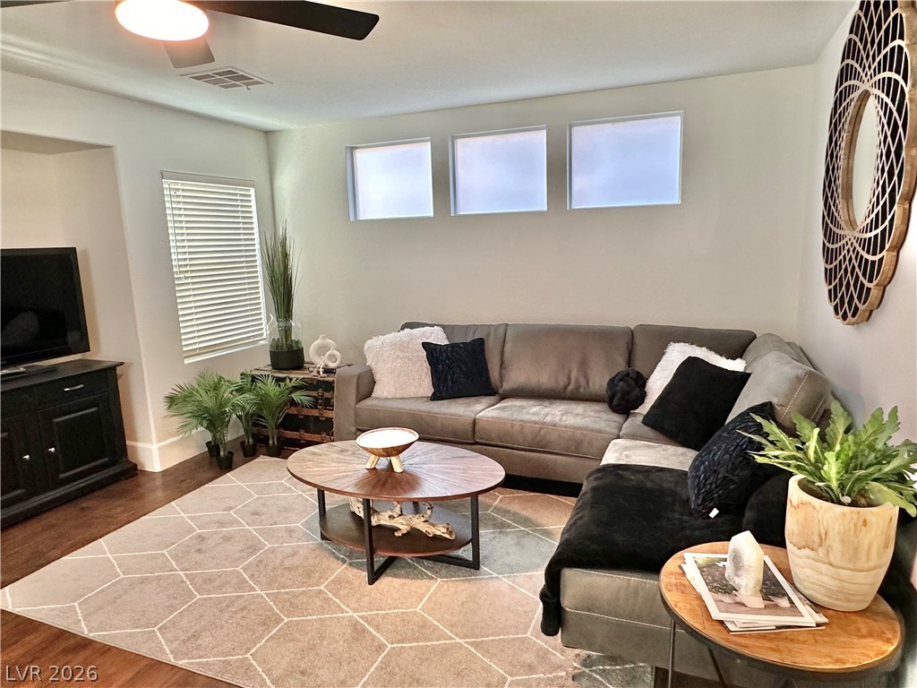 10263 Splendor Ridge Avenue Las Vegas, NV 89135 - Photo 3 of 55 FAMILY ROOM WITH FIREPLACE AND CEILING FAN.