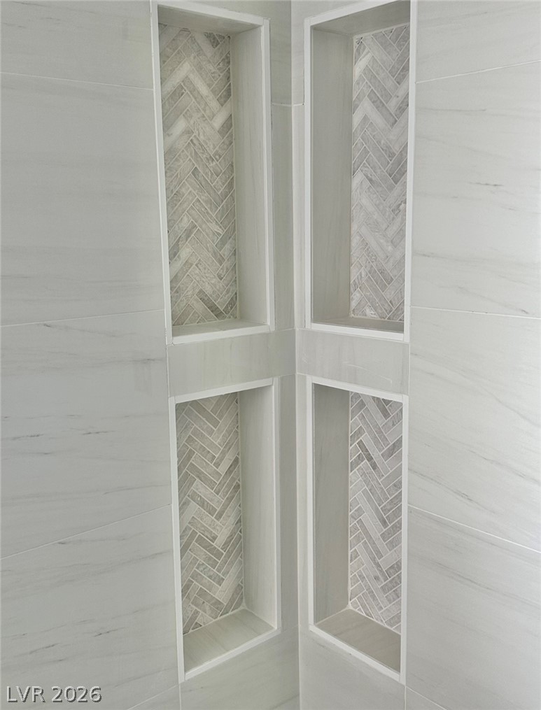 10263 Splendor Ridge Avenue Las Vegas, NV 89135 - Photo 36 of 55 Main bath custom shampoo shower niches.