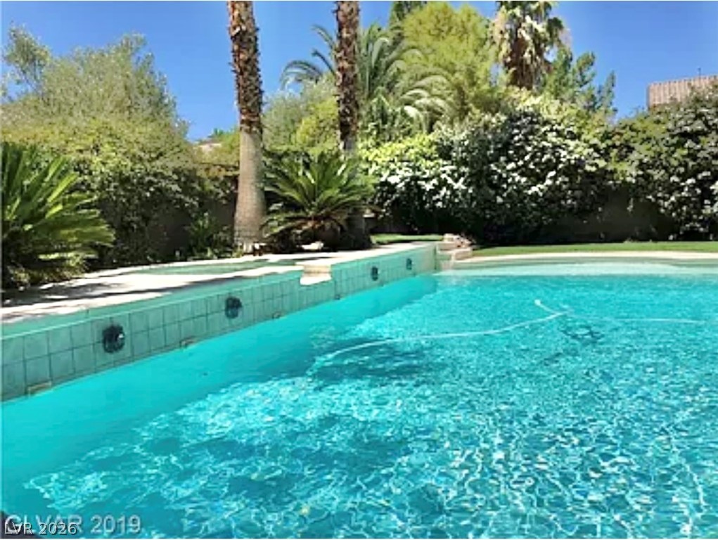 10263 Splendor Ridge Avenue Las Vegas, NV 89135 - Photo 4 of 55 Tranquil and relaxing greenery.