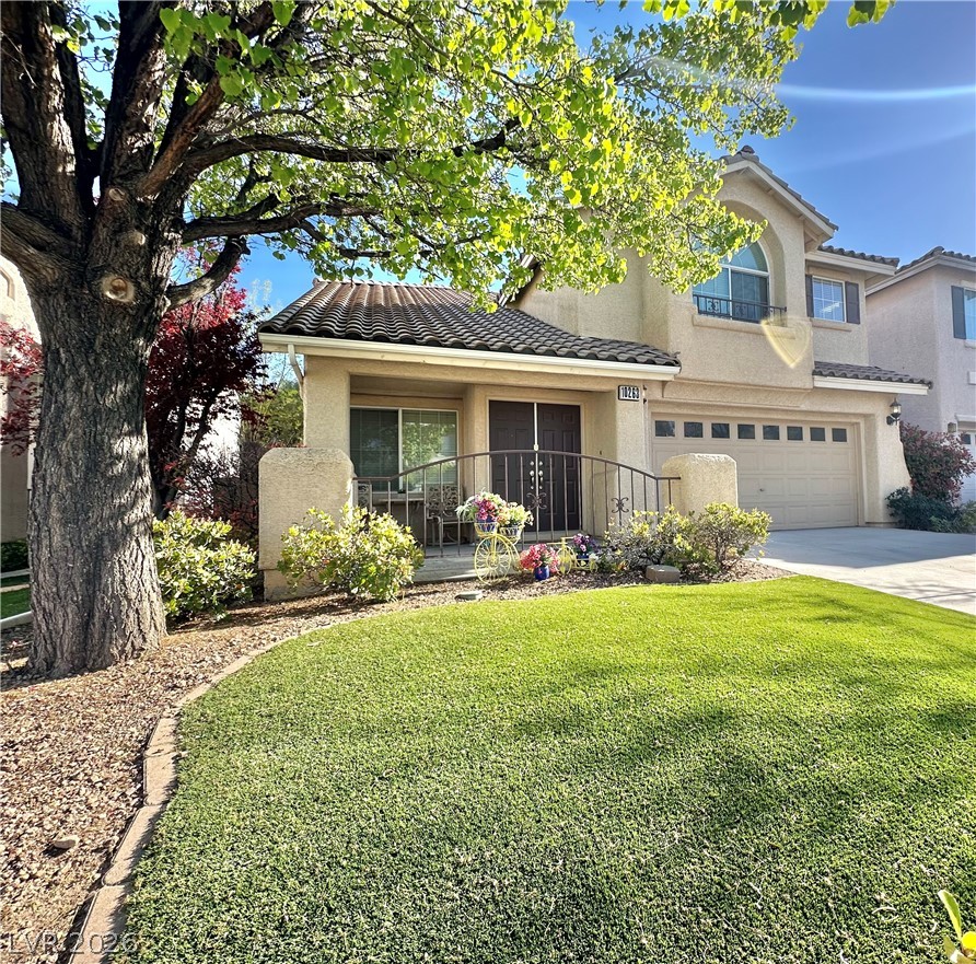 10263 Splendor Ridge Avenue Las Vegas, NV 89135 - Photo 52 of 55 Synthetic lawn front and back.