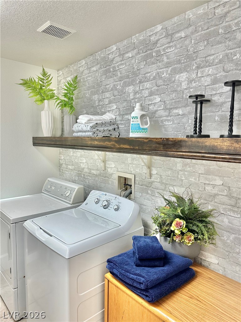 10263 Splendor Ridge Avenue Las Vegas, NV 89135 - Photo 55 of 55 Super spacious laundry room with storage drawers.
