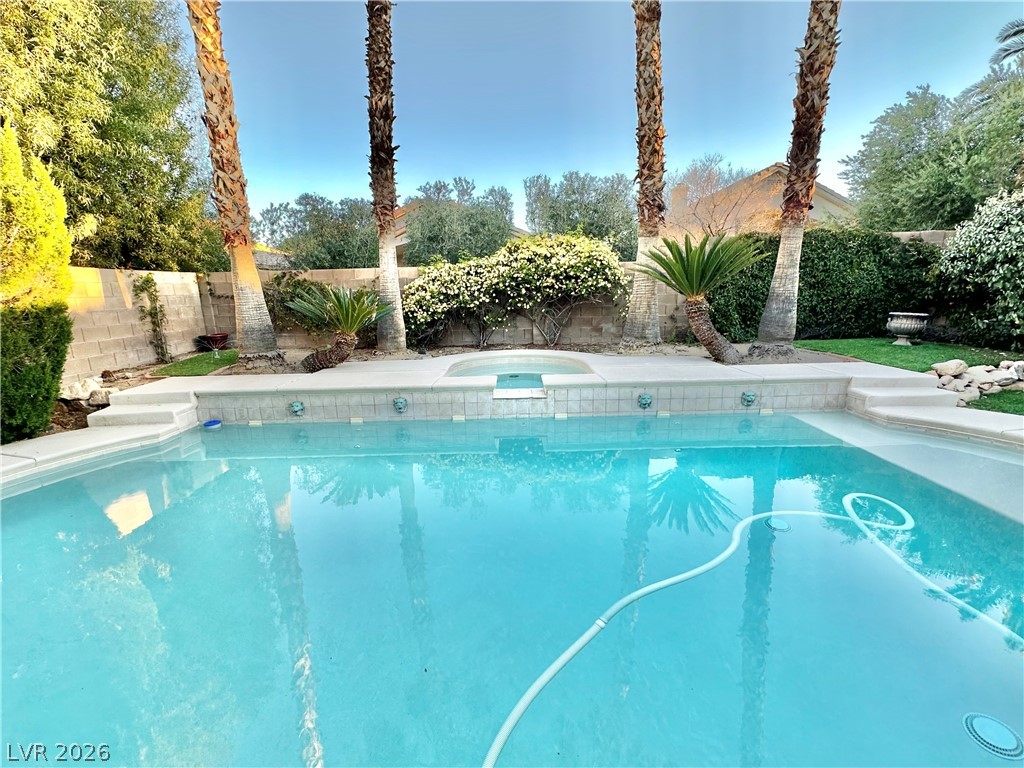 10263 Splendor Ridge Avenue Las Vegas, NV 89135 - Photo 8 of 55 LARGE POOL AND SPA.