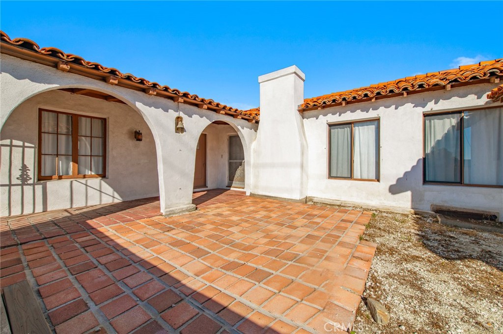 1885 West 9th Street Upland, CA 91786 - Photo 5 of 41 a front view of a house with a big yard