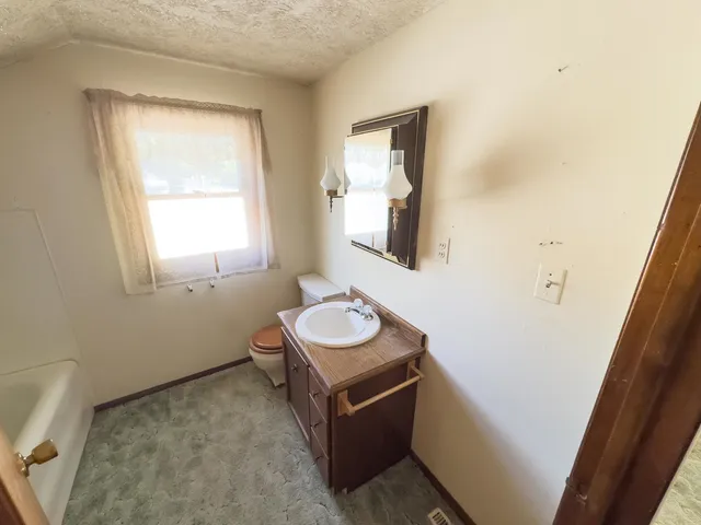 a room with furniture and window