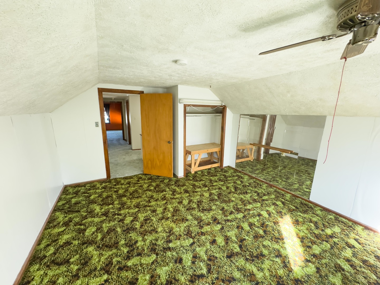 702 East Timber Street Pontiac, IL 61764 - Photo 22 of 25 a bedroom with a bed and a dresser
