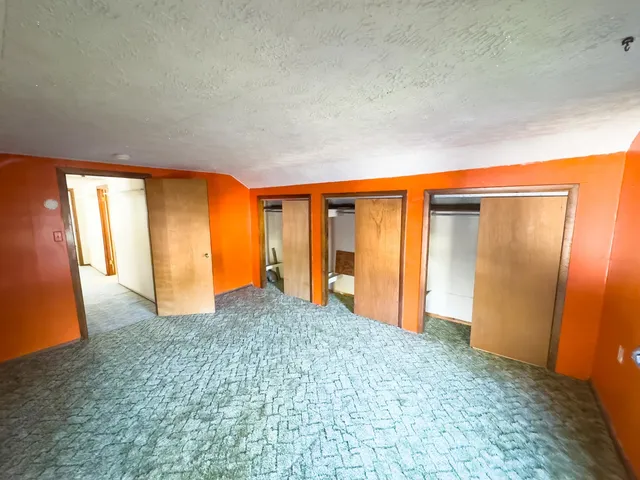 an empty room with closet