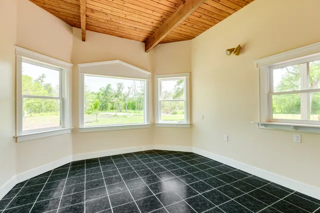 an empty room with windows