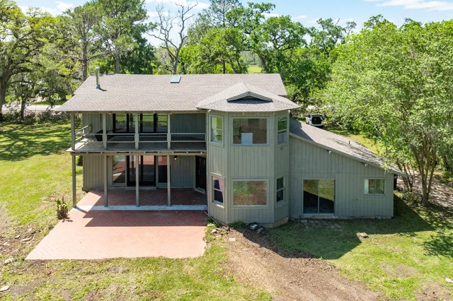 a backyard of a house with seating space